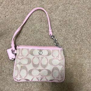 Used Small pink coach wristlet